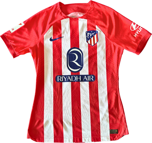 Jersey Atlético de Madrid local Reinildo preparado y firmado